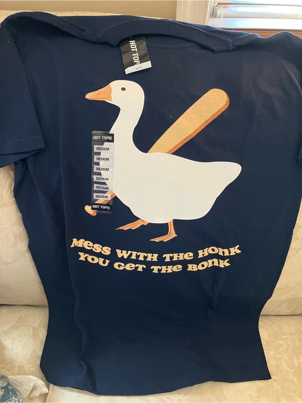 Goose with ball bat unisex tee
